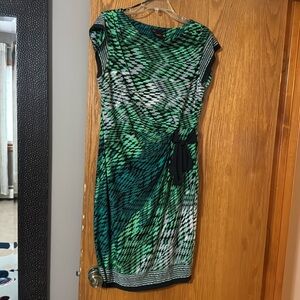 Women’s dress (just above knee).